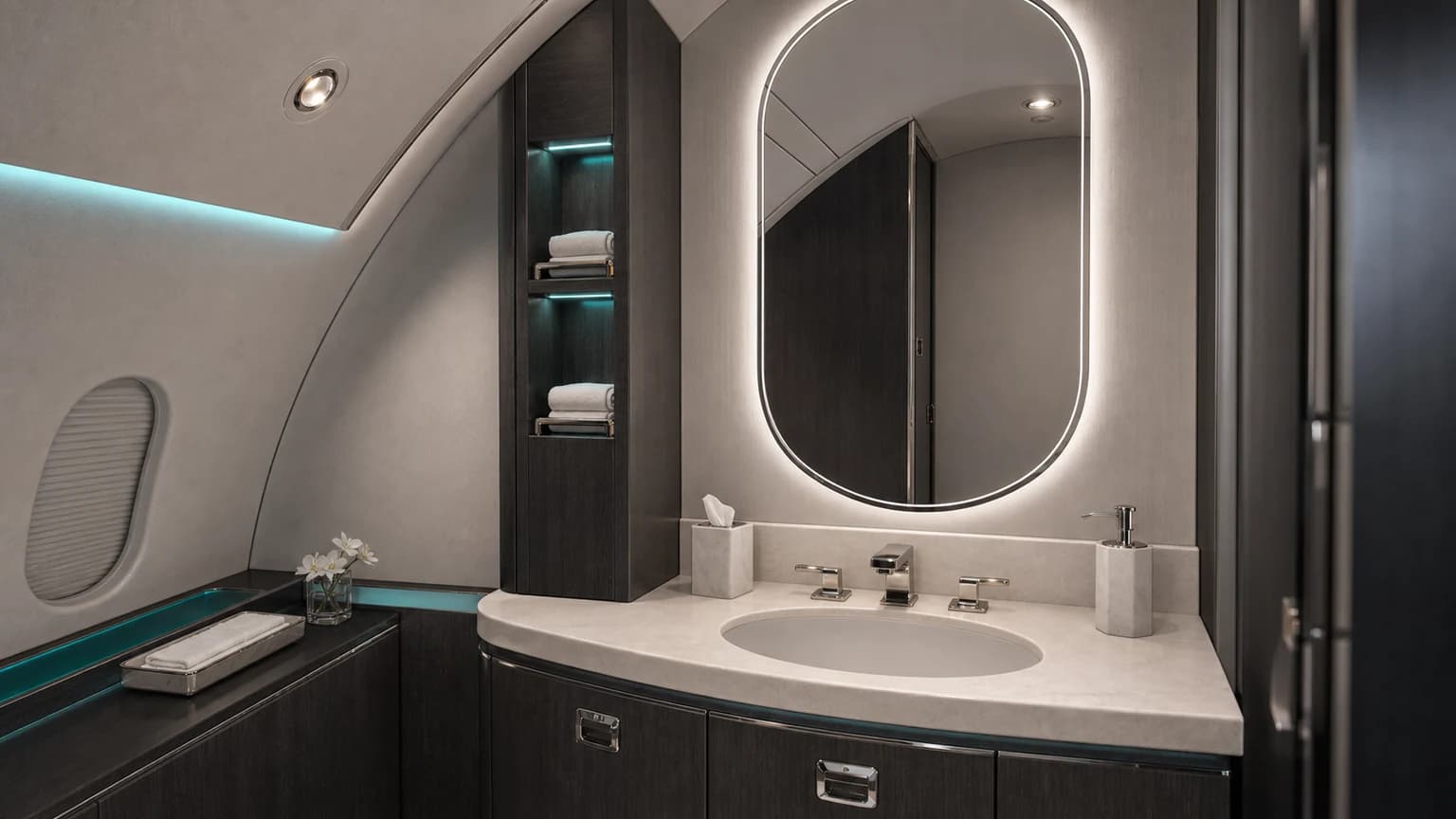 Bombardier Learjet 75 — illustrative charcoal lavatory